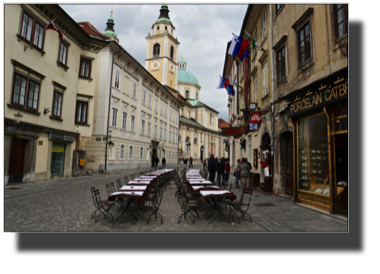 Street in Ljubljana and the Cathedral of Sty. Nicholas DSC02216.jpg Street in Ljubljana and the Cathedral of Sty. Nicholas DSC02216.jpg